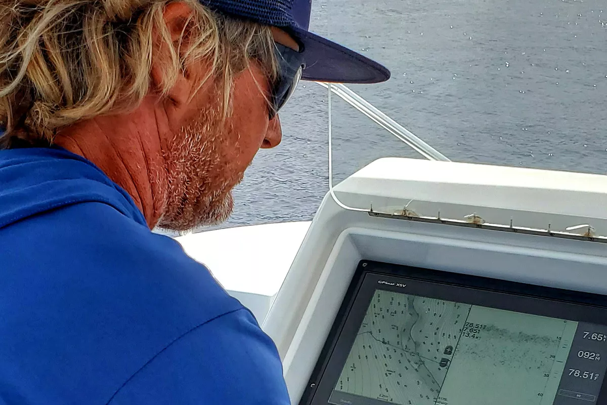 Blue Marlin Fishing Captain Kevin Hibbard showing how he drives boat while trolling