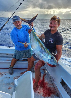 Shawn Rotella and Arthur Bjontegard with a yellowfin tuna caught off of Kona