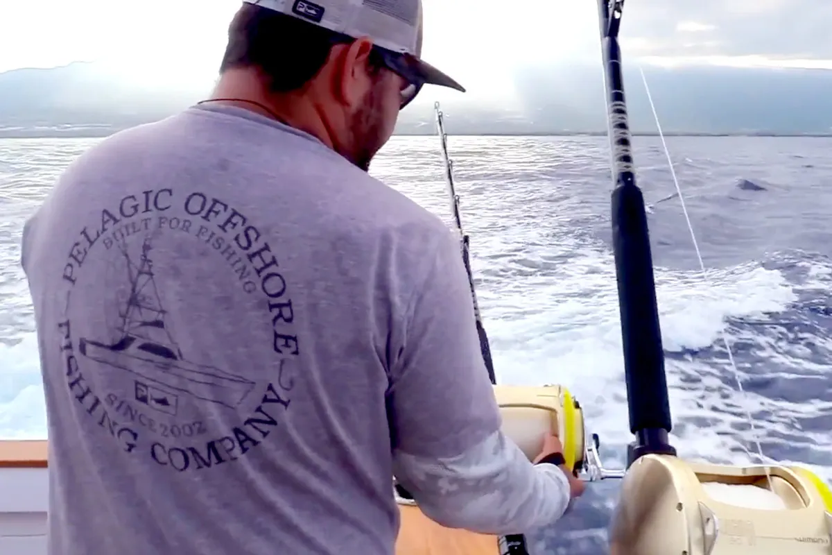 Kris Ishibashi putting out a lure spread for marlin fishing