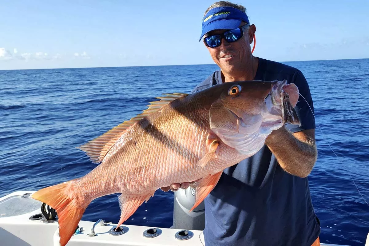 in the spread instructor ryan van fleet with a mutton snapper