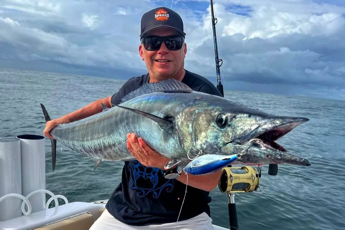 seth horne with a wahoo caught fishing with colio sportfishing in costa rica