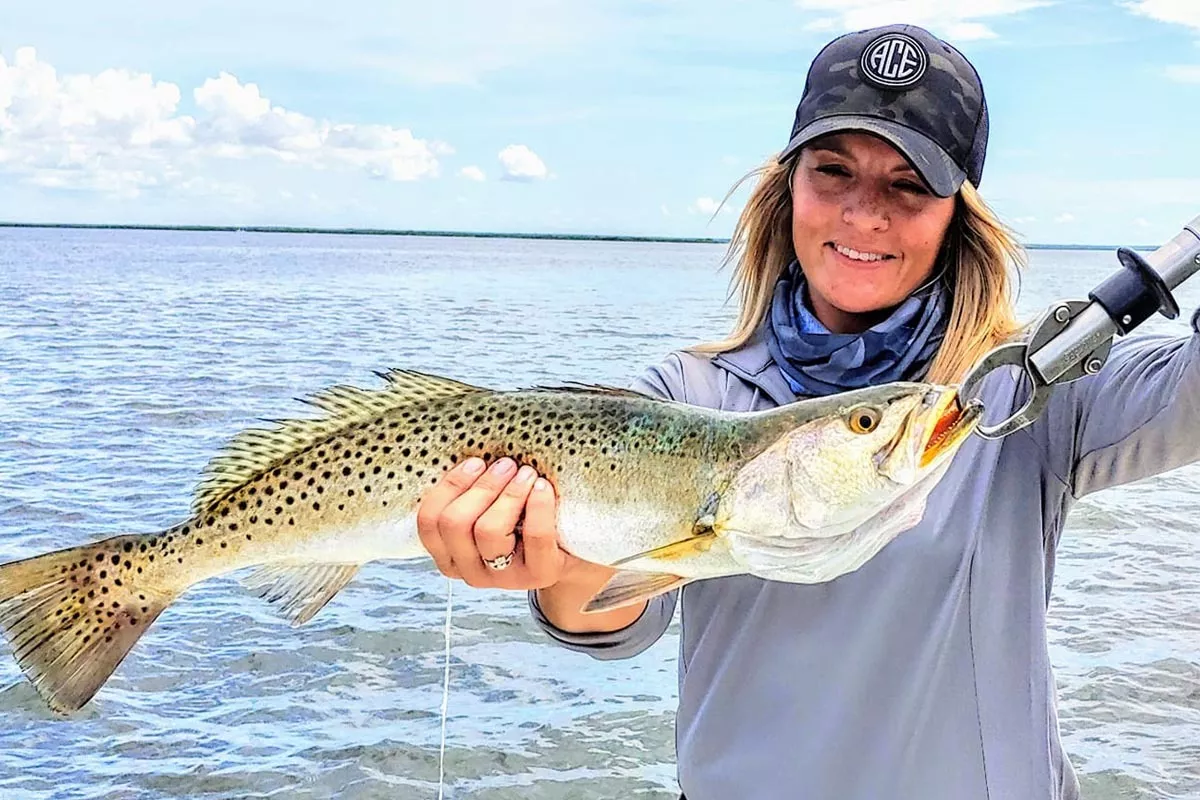 Florida seatrout held by lady angler caught with william toney in Homosassa