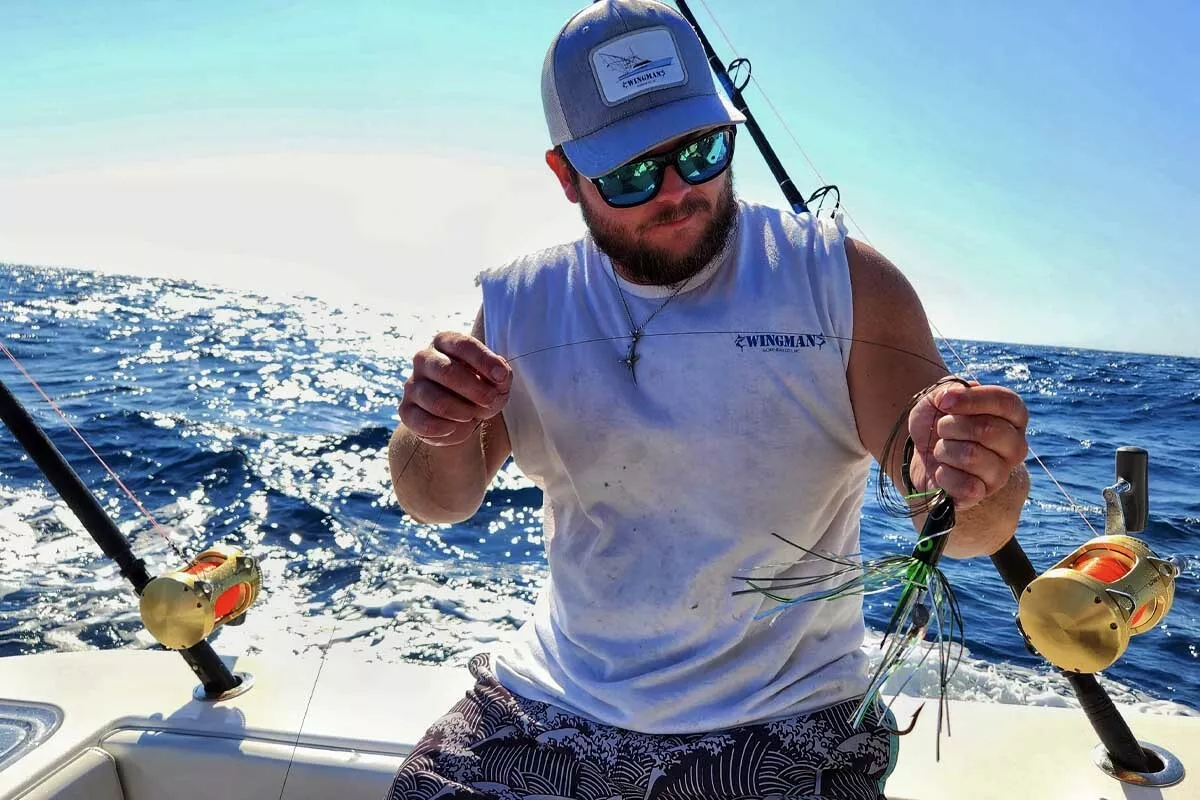 Luke Garner holding gore offshore bait rig for ballyhoo slow trolling wahoo