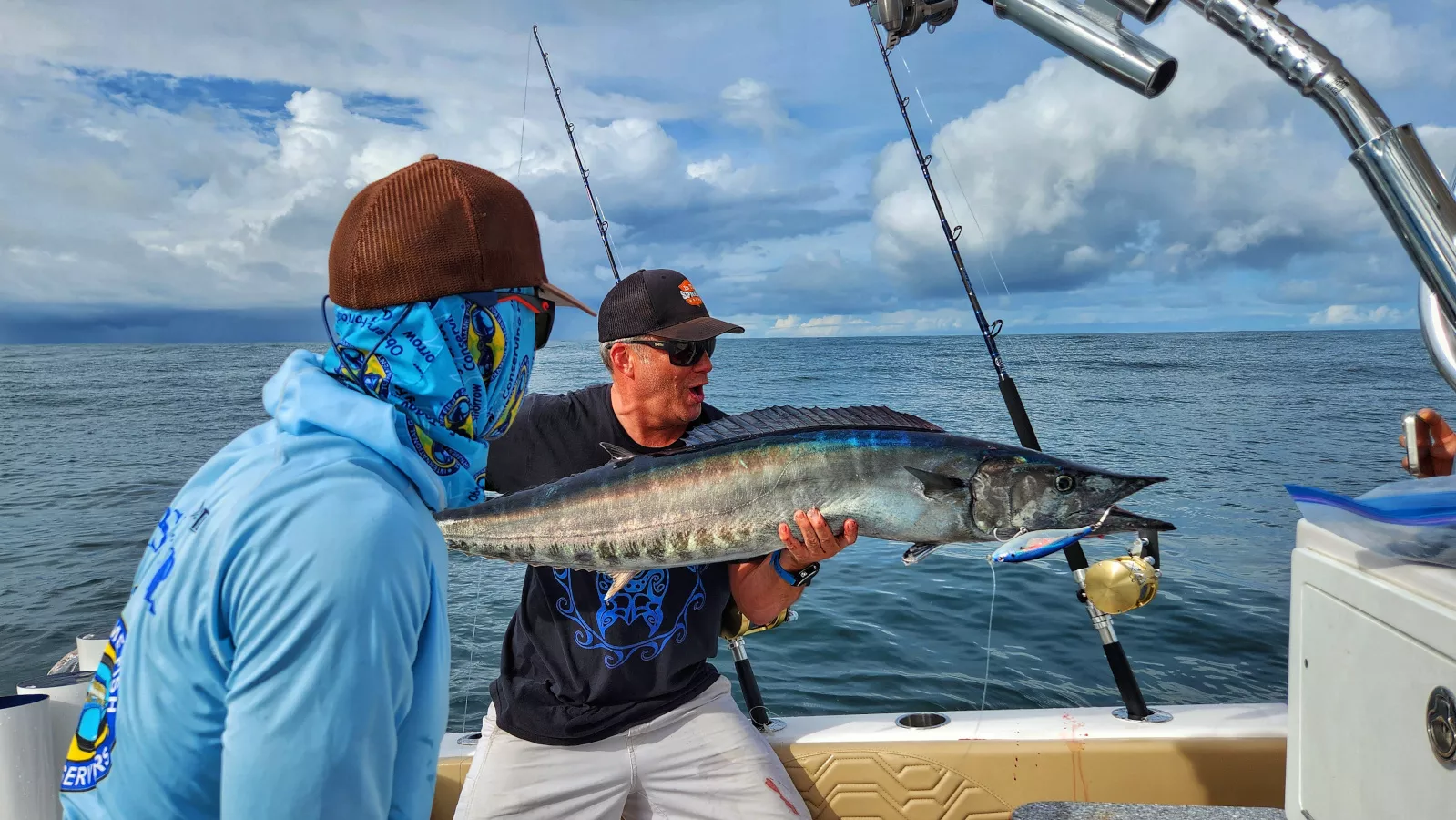 Seth Horne holding a nice wahoo in Costa Rica caught trolling stickbaits