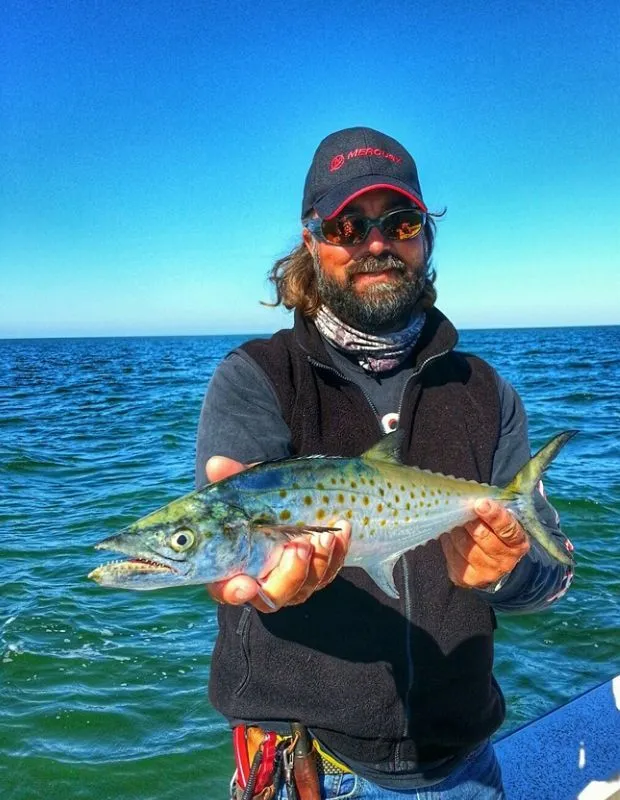 Capt. William Toney with a Spanish mackerel caught reef fishing