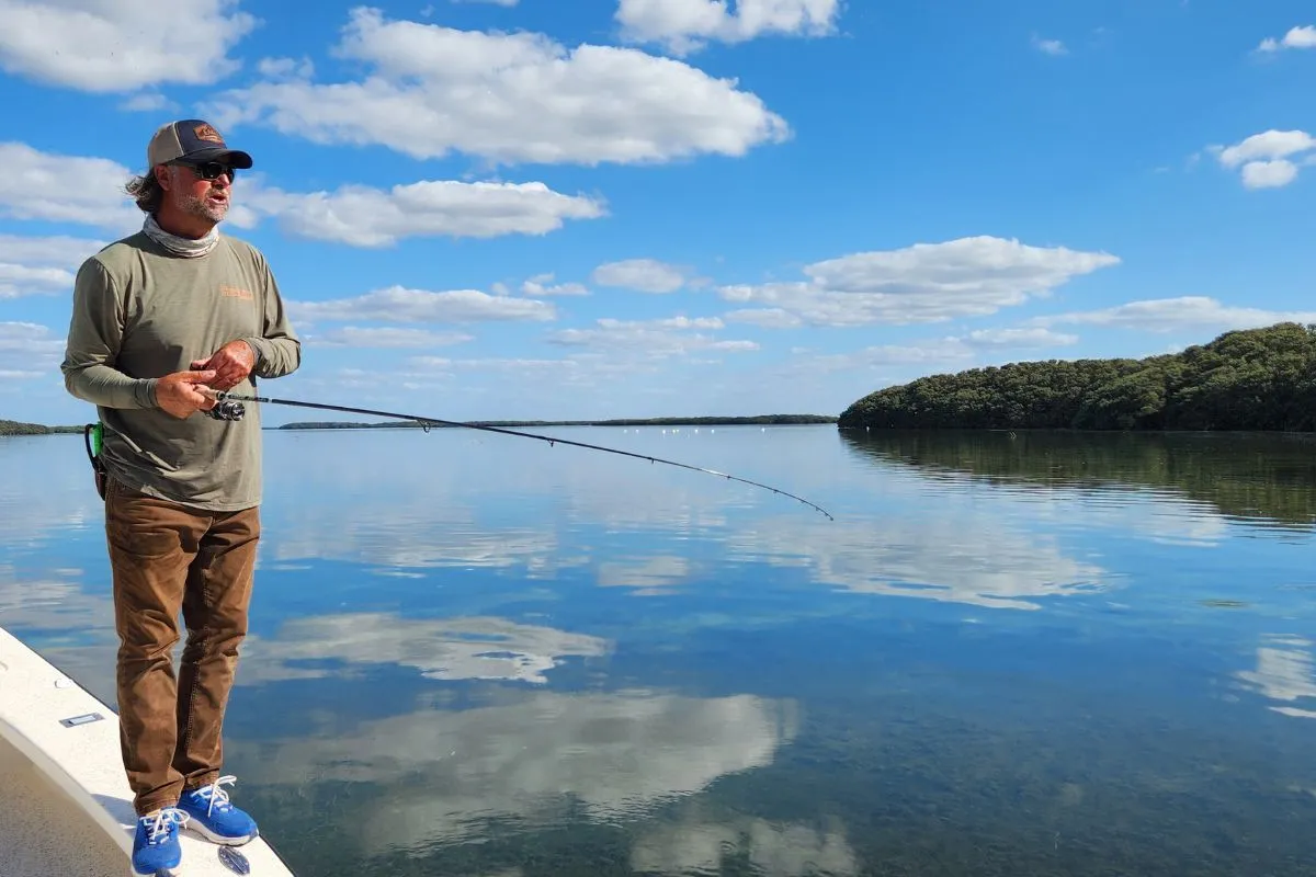 inshore fishing guide wearing maui jim polarized sunglasses