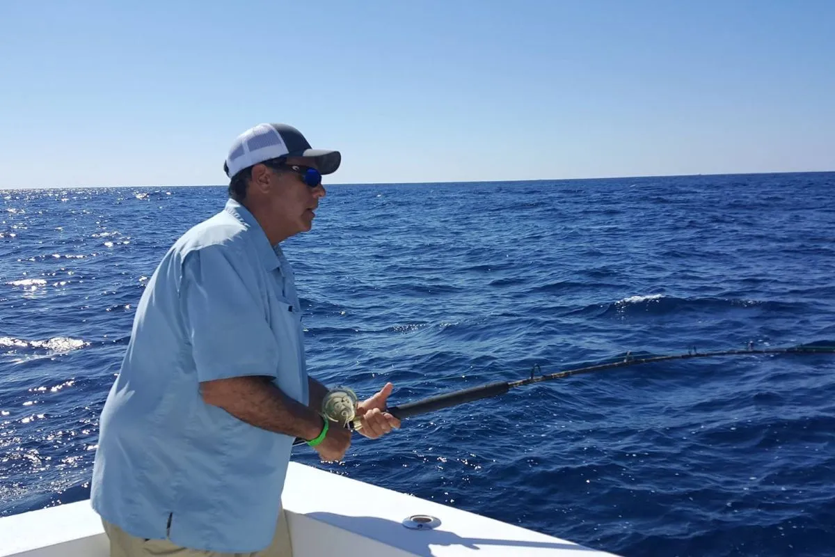 bill pino fighting a sailfish with light tackle conventional reel