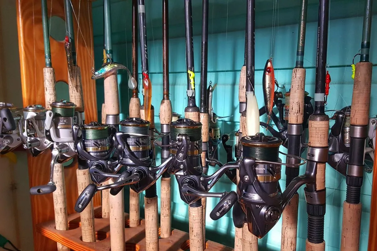collection of light tackle rods and reels for heavy inshore fishing