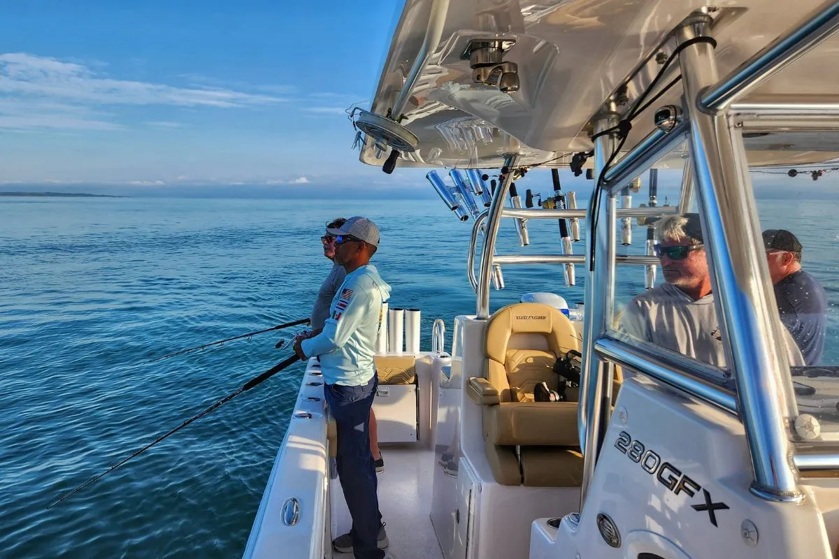 Captain Mike Hennessy at the helm of a Colio Sportfishing boat, bottom fishing in the southern zone