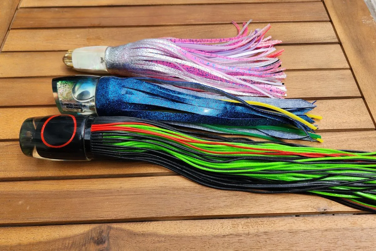 Vinyl, rubber, and silicone trolling lure skirts in assorted colors laid out for rigging