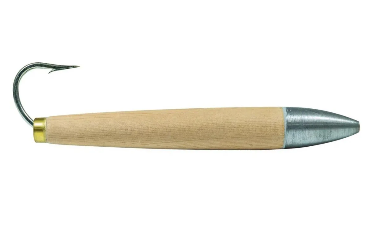 Natural wood cedar plug with zinc bullet head and single hook for trolling tuna, dorado, and wahoo.