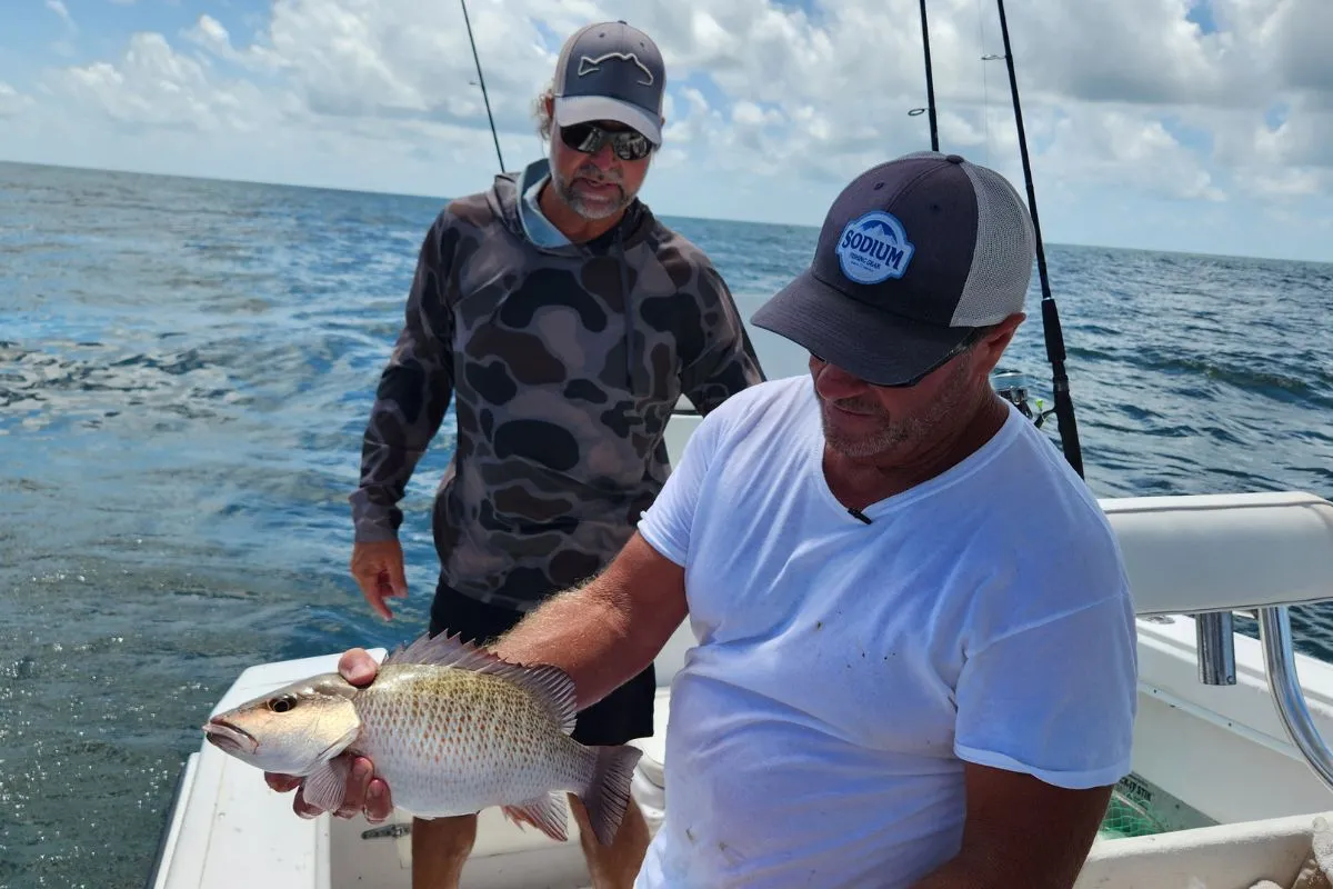 Capt. Chris Wilkins with a mangrove snapper caught offshore of Homosassa, Florida