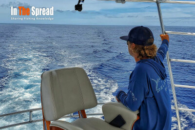Kevin Hibbard scanning the lure spread while teaching Boat Driving for marlin fishing in Kona