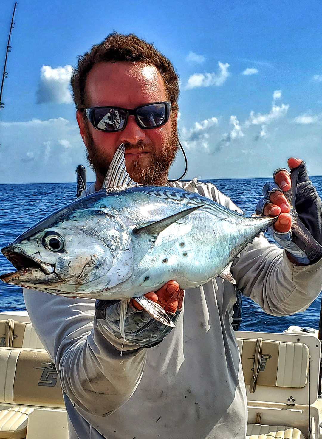 Patrick Smith shows bonito caught Florida Nearshore Reef Fishing