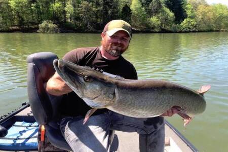 Cory Allen with one of his many giant muskie