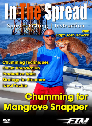 Capt. Josh Howard holds a nice mangrove snapper caught chumming in Louisiana