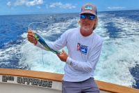 Kevin Hibbard holding a vinyl skirted Marlin Magic Ruckus