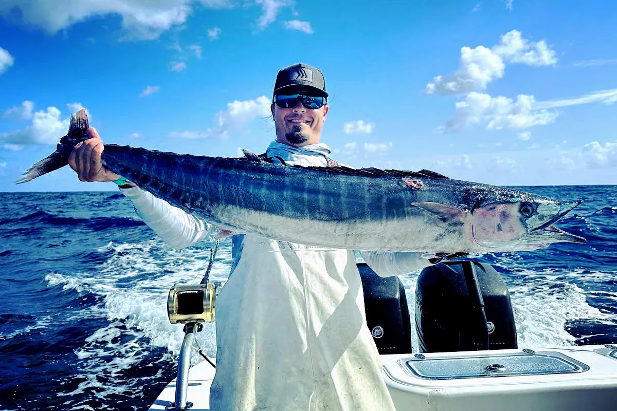 Mike Dupree with a wahoo caught slow trolling