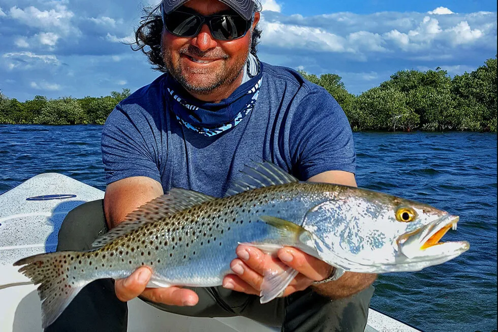 William Toney holds a Winter Seatrout caught Fishing Homosassa
