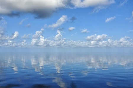 white puffy clouds indicating stable atmospheric pressure