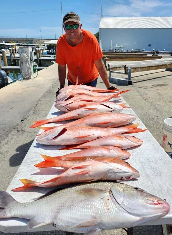 table full of mutton snapper caught with good karma sportfishing in key largo