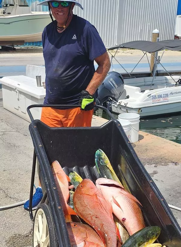 captain ryan van fleet with a load of fish