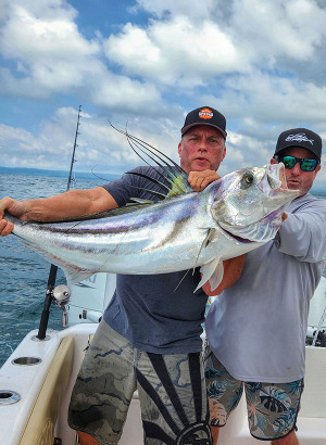 Seth Horne catches a big roosterfish in Costa Rica with Colio Sportfishing