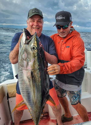 Mike Hennessy and crew with a nice yellowfin tuna caught fishing with In The Spread in Costa RIca