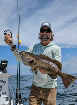 Capt. William Toney with a fat Florida gag grouper