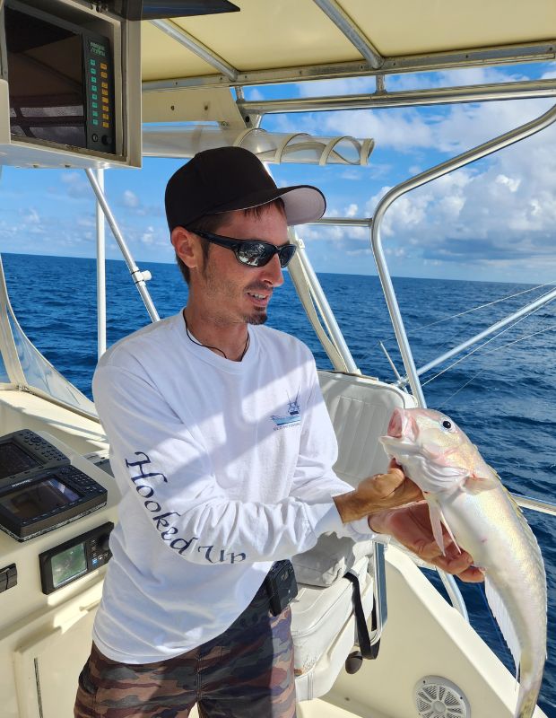 Chad Raney of Old Hat Fishing holding a tilefish