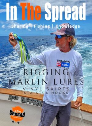 Kevin Hibbard displays a blue marlin trolling lure rigged with vinyl skirt