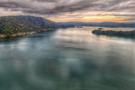 Aerial view of the Golfo Dulce surrounded by primary rainforest, Golfito visible in the background