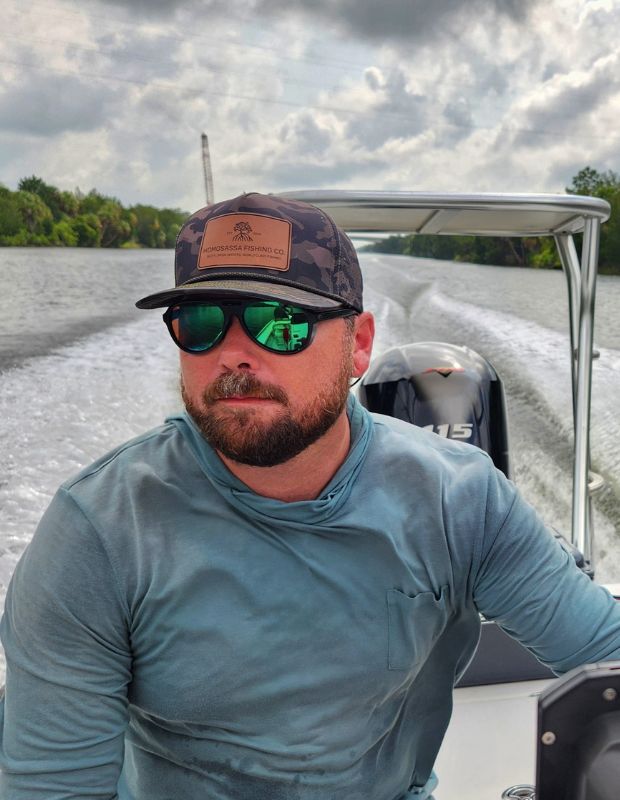 Captain Madison MacDonald running his Maverick skiff in nearshore waters near Yankeetown, Florida